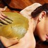 woman having ayurvedic skincare massage