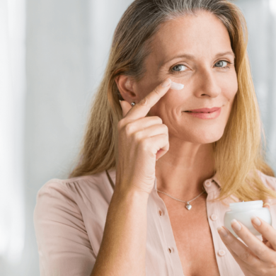 woman applying the best anti aging moisturizer